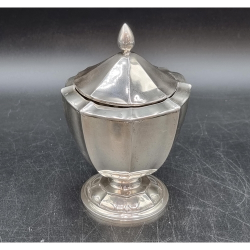 129 - An Edward VII silver Tea Caddy of panelled circular form on pedestal base, Birmingham 1909