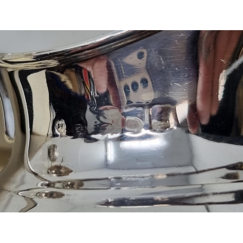 142 - An Edwardian silver Jug with spiral gadroon embossing, marks worn, circa 1905