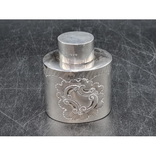 148 - A Victorian silver oval Tea Caddy embossed rococo cartouche, London 1893