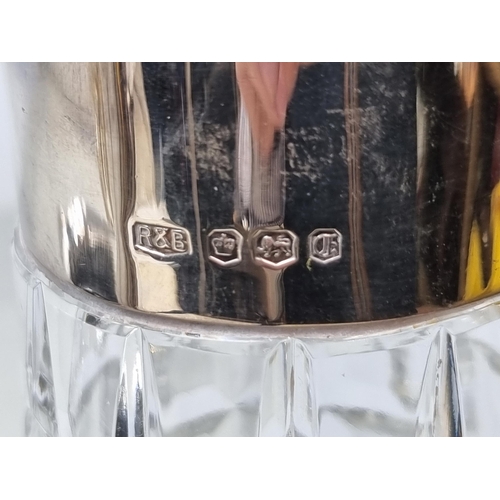 149 - An Elizabeth II silver mounted glass Claret Jug with ornate spout, griffin handle, Sheffield 1973, m... 