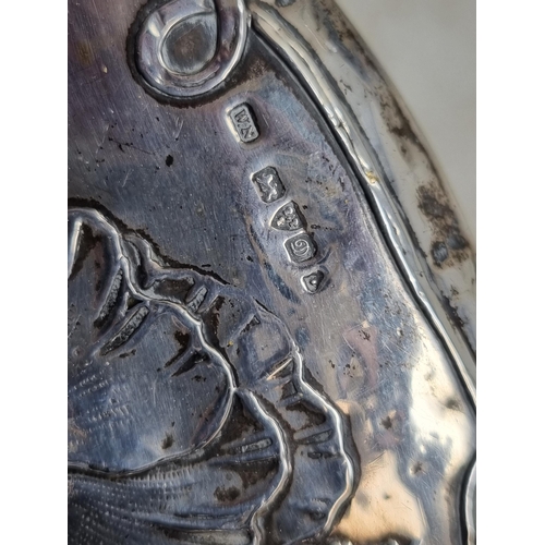 154 - An Edward VII Art Nouveau silver mounted Brush and Mirror floral embossed, Chester 1902 & 1904