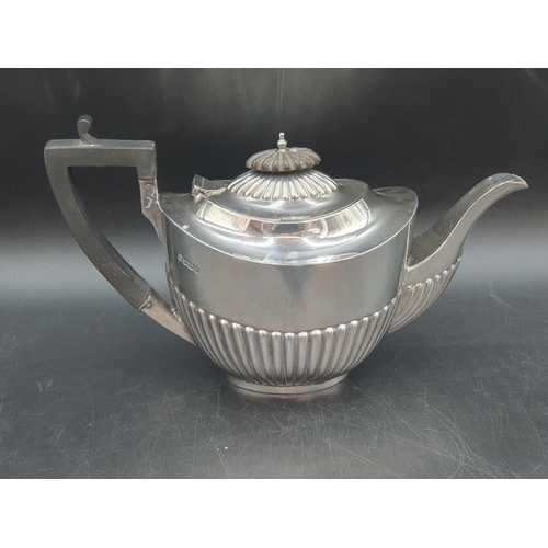 167 - A George V silver Teapot of oval semi-fluted form, Sheffield 1913, 320gms