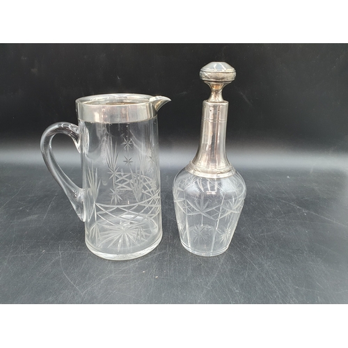 169 - A George V silver mounted cut glass Jug, Birmingham 1924, and a silver mounted cut glass Liqueur Dec... 