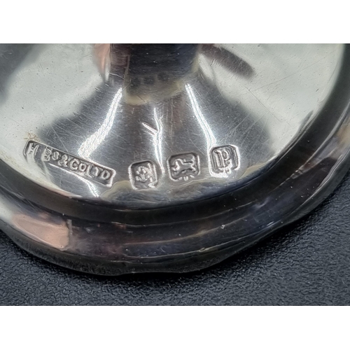 180 - A pair of George V silver Posy Vases, Birmingham 1914, 5 1/2in, and another, Chester 1906