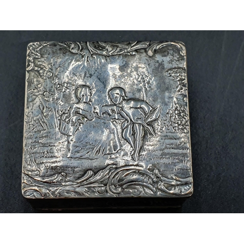 186 - A Dutch silver small square Box decorated romantic figures in landscape. two oval 800 Boxes engraved... 