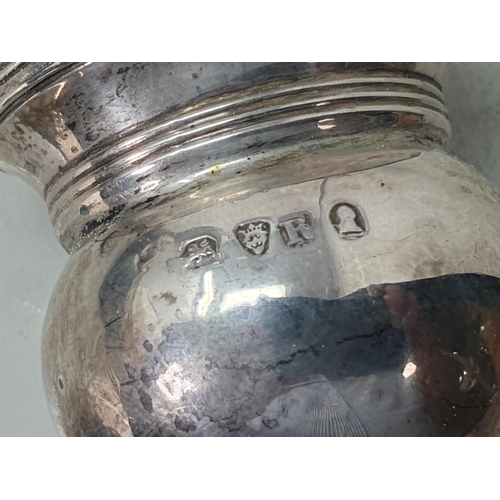 195 - A George III silver Pepperette, London 1812, two silver Pepper Mills, London 1938 and Sheffield 1933... 