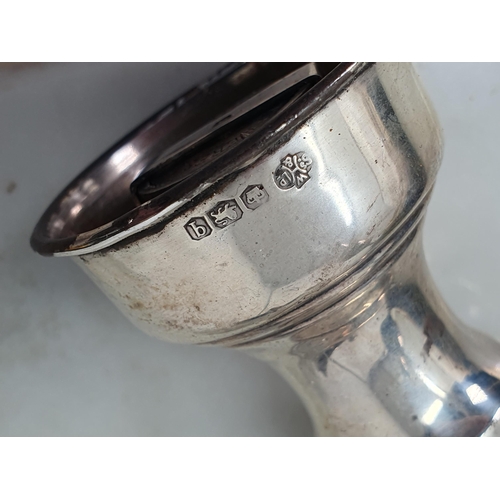 195 - A George III silver Pepperette, London 1812, two silver Pepper Mills, London 1938 and Sheffield 1933... 