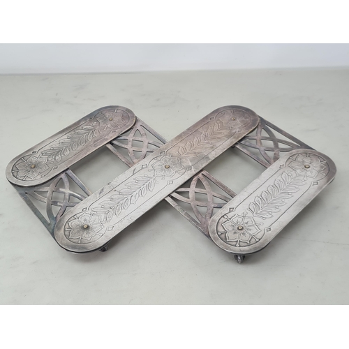 206 - An unusual silver plated Extending Table Coaster with floral and leafage decoration on seven swivel ... 
