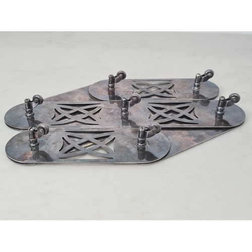 206 - An unusual silver plated Extending Table Coaster with floral and leafage decoration on seven swivel ... 