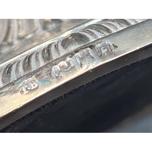 210 - A pair of Edward VII silver Taper Sticks with knop stems on gadroon square bases, London 1902, 5in