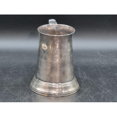 212 - A George III silver Pint Mug having scroll handle with heart shape finial, engraved initials S over ... 