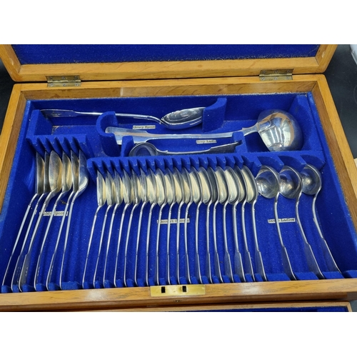 213 - A Victorian silver Canteen of Cutlery fiddle pattern, London 1896, viz: 18 Dinner & Dessert Forks, (... 