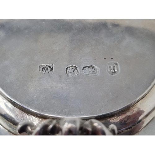 216 - A William & Mary silver Tankard with flat cover, vollute thumb piece, scroll handle engraved initial... 