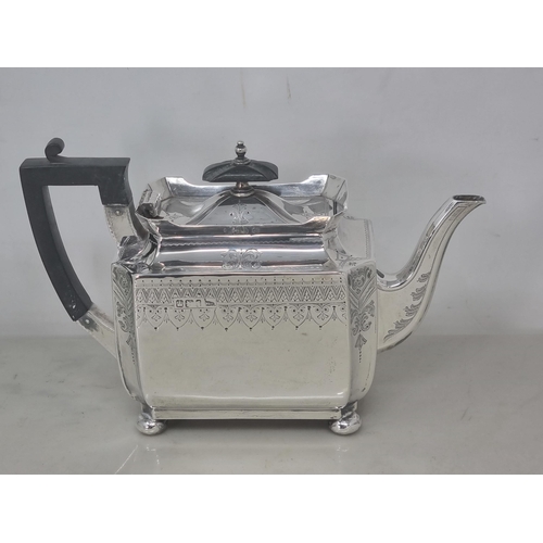 217 - A Victorian silver four piece Tea & Coffee Service of shaped oblong form with finely engraved frieze... 