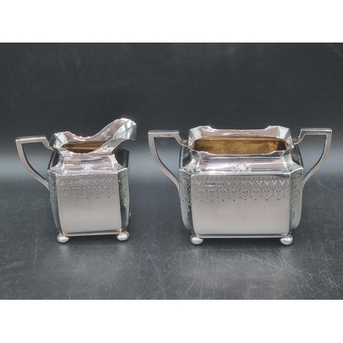 217 - A Victorian silver four piece Tea & Coffee Service of shaped oblong form with finely engraved frieze... 