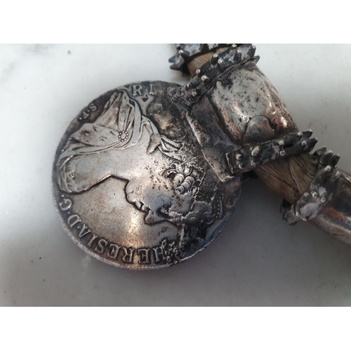 223 - A Middle eastern white metal Dowry Necklace mounted with seven re-strike Austria Maria Theresa silve... 