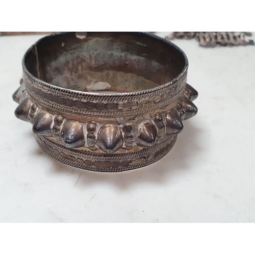 229 - Four Middle Eastern white metal Amulet/Koran Holder style Pendants, a bangle and a Finger Ring set c... 