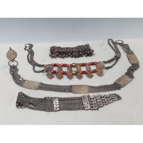 230 - A Middle Eastern Omani white metal Necklace with coral coloured bead spacers, plus a Bell Bracelet/A... 