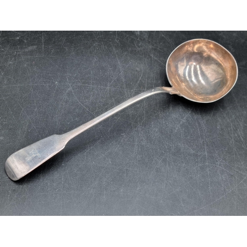 31 - A Victorian silver Soup Ladle fiddle pattern engraved crest, London 1850, maker: G.A