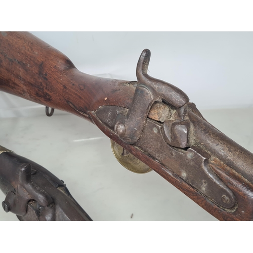 996 - Two 19th Century Percussion Muskets, both showing evidence of tribal ownership 43in and 52in L overa... 
