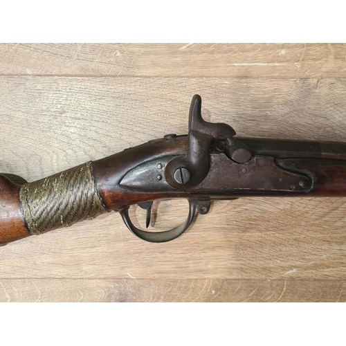 996 - Two 19th Century Percussion Muskets, both showing evidence of tribal ownership 43in and 52in L overa... 