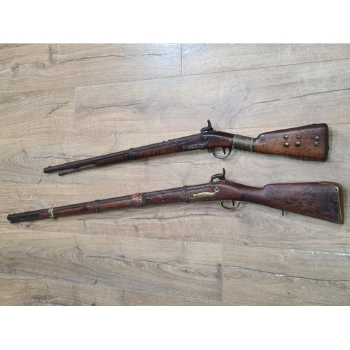 996 - Two 19th Century Percussion Muskets, both showing evidence of tribal ownership 43in and 52in L overa... 