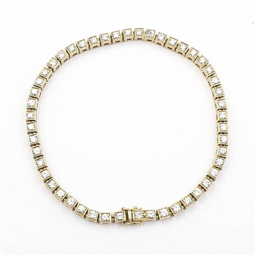 A Diamond-set Line Bracelet, 49 pavé-set round brilliant-cut diamonds ...
