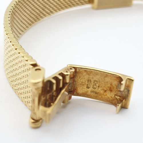 252 - A lady's Omega manual-wind Wristwatch the square champagne dial with baton markers on integral 18ct ... 
