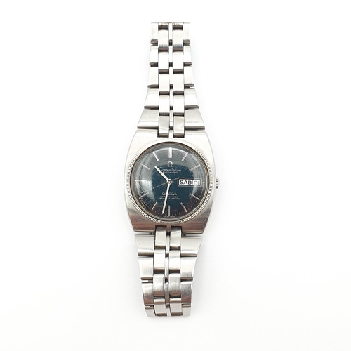 253 - An Omega Constellation gentleman's Wristwatch, the black enamel dial with applied silver baton marke... 