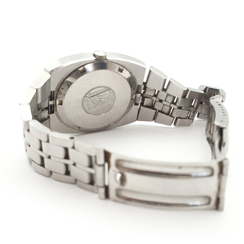 253 - An Omega Constellation gentleman's Wristwatch, the black enamel dial with applied silver baton marke... 