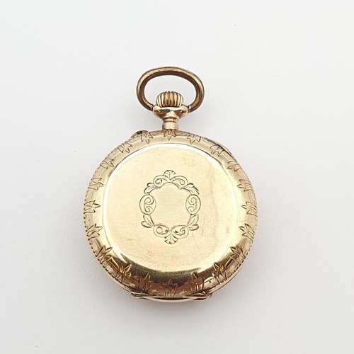 255 - A continental Lady's Fob Watch, the white enamel dial having Roman numerals and Louis XVI gold hands... 