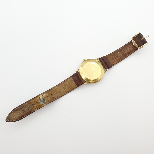260 - An Omega gentleman's automatic Wristwatch, the textured champagne enamel dial with gold-coloured app... 