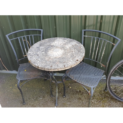827 - A Garden Table with reconstituted top on metal base and two garden Chairs