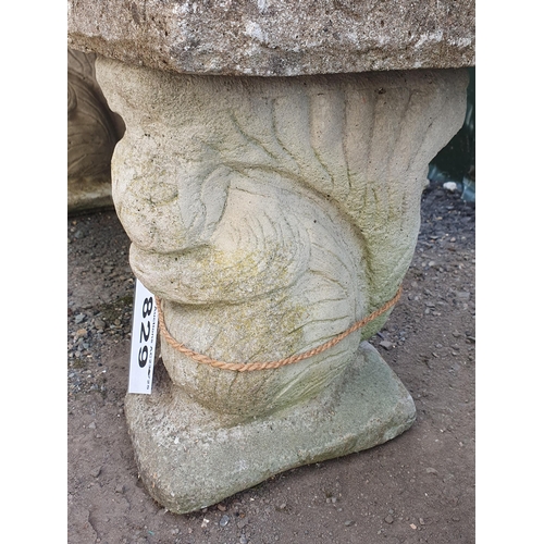 829 - A reconstituted Garden Bench, the supports modelled as rabbits