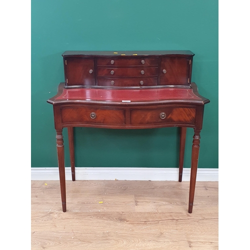 A reproduction serpentine fronted Writing Desk 3ft 3