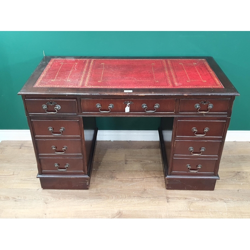 A Mahogany writing desk fitted nine drawers and leather insert top, 2ft ...
