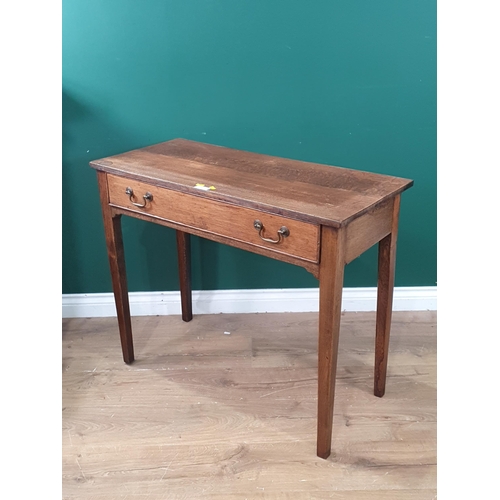 407 - An Oak single Drawer side table raised on squared tapering supports, 2ft 6