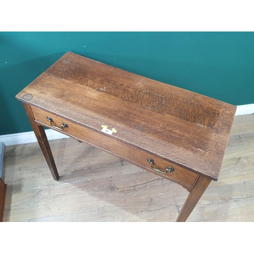 407 - An Oak single Drawer side table raised on squared tapering supports, 2ft 6