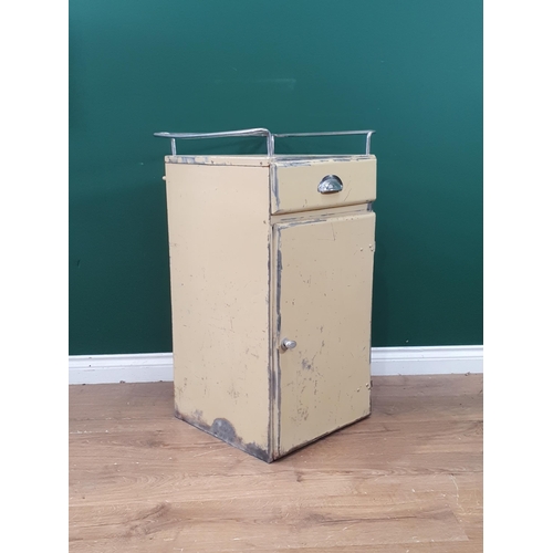 413 - A Metal industrial cabinet with raised metal bar fitted single drawer above single cupboard door, 2f... 