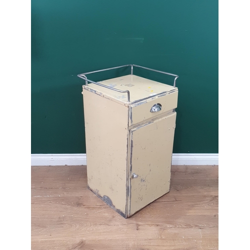 413 - A Metal industrial cabinet with raised metal bar fitted single drawer above single cupboard door, 2f... 