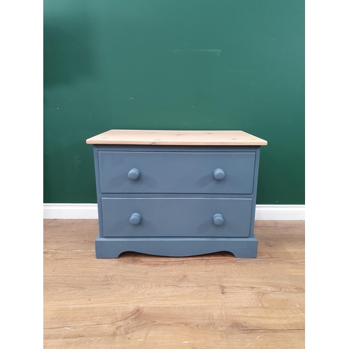 415 - A blue Chest of small proportions fitted two long drawers with shaped apron, 1ft 10