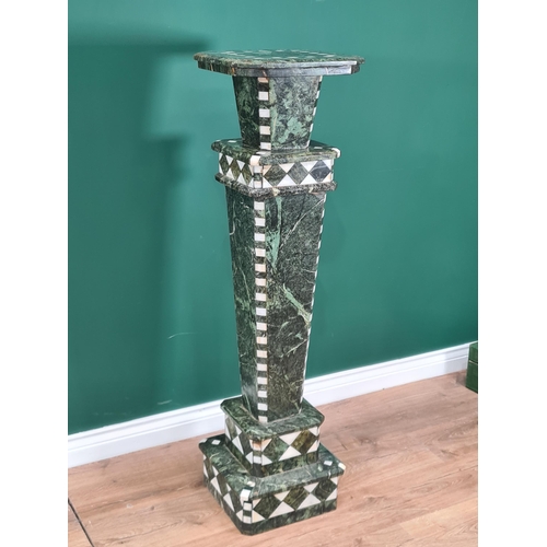 A large green marble Column with white marble inlay having chamfered ...