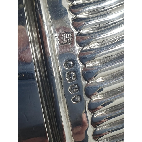 31 - A Victorian silver Sugar Caster with spiral fluted  cover and base, London 1885, maker: Finlay & Tay... 