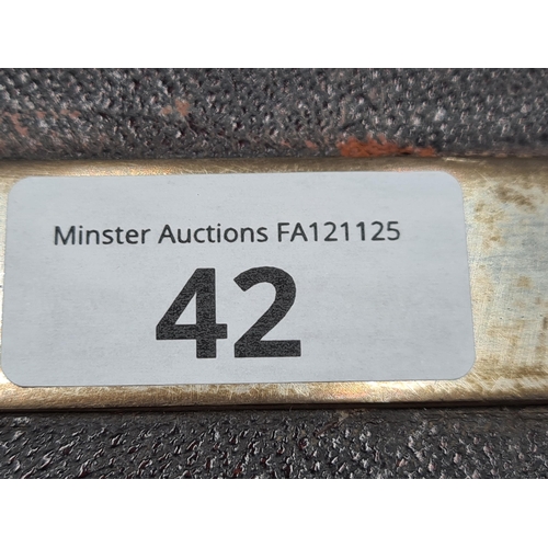 42 - A pair of George III silver Berry Spoons and Sifting Ladle with embossed bowls and engraved stems, L... 