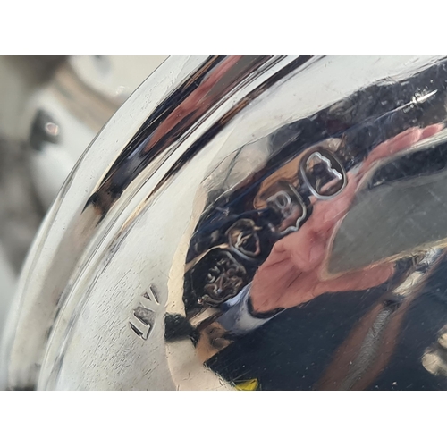 44 - A William IV silver circular Milk Jug with gadroon rim, leafage scroll handle on  paw feet, London 1... 