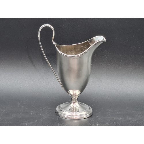 46 - A George III silver helmet shape Milk Jug engraved initials on circular base, London 1791, maker: Ro... 