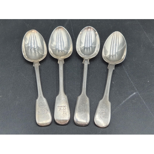 58 - Four silver Dessert Spoons fiddle pattern, various dates, 178gms