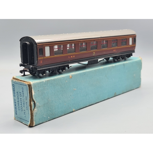 123 - A boxed Hornby Dublo D3 LMS 1/3rd Coach, M, in the rare 4/48 box of which few were made with a produ... 