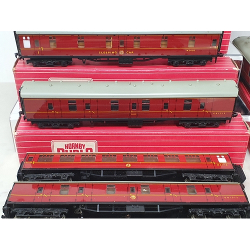 151 - Five boxed Hornby Dublo BR Coaches comprising 2x 4075 Passenger Brakes and 3x 4078 Composite Sleepin... 
