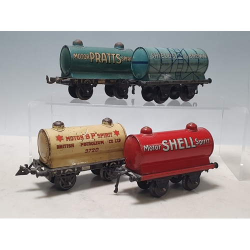 427 - Four Bing 0 gauge Tank Wagons comprising Shield's & Brown, Motor Shell Spirit, Motor BP Spirit and M... 